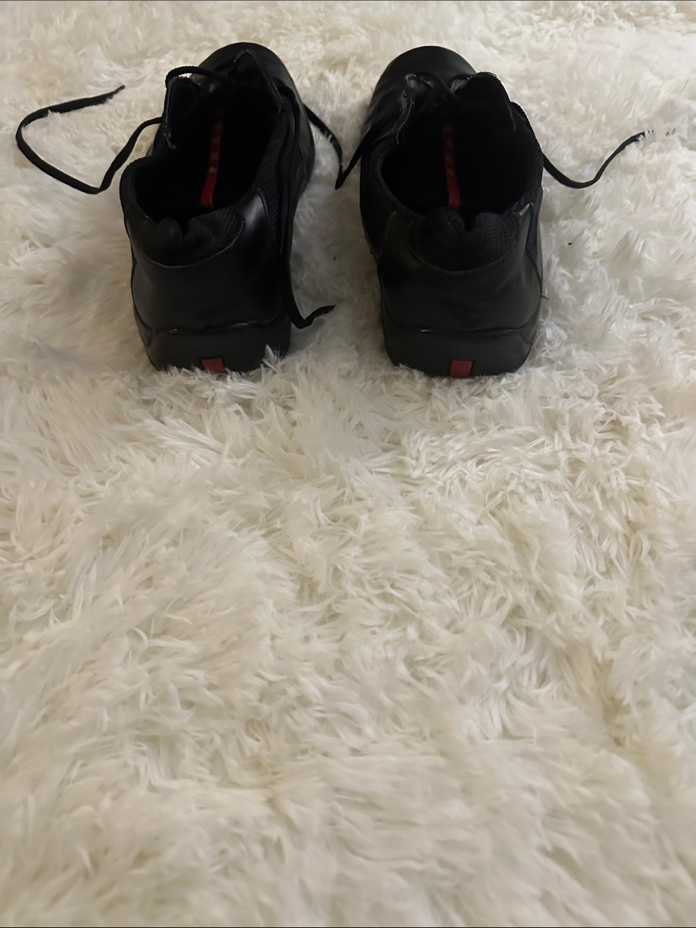Prada Black Leather & Mesh Athletic Sneakers with Red Tongue Tab